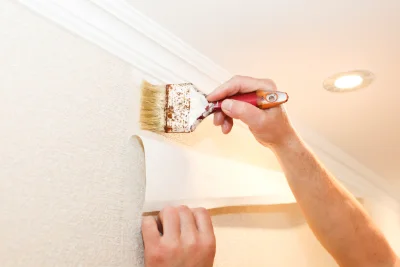 Pose de papier peint à Auty — revêtements muraux et toiles de verre